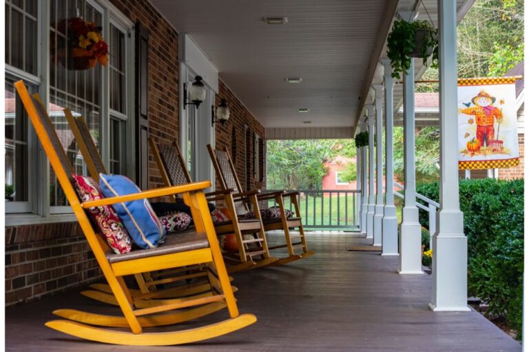 3 wooden rocking chair at the porch